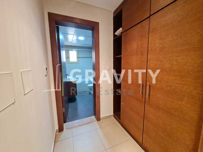 Room-having-built-in-wooden-wardrobes-leading-to-the-attached-bathroom-in-5-bedroom-Villa-for-sale