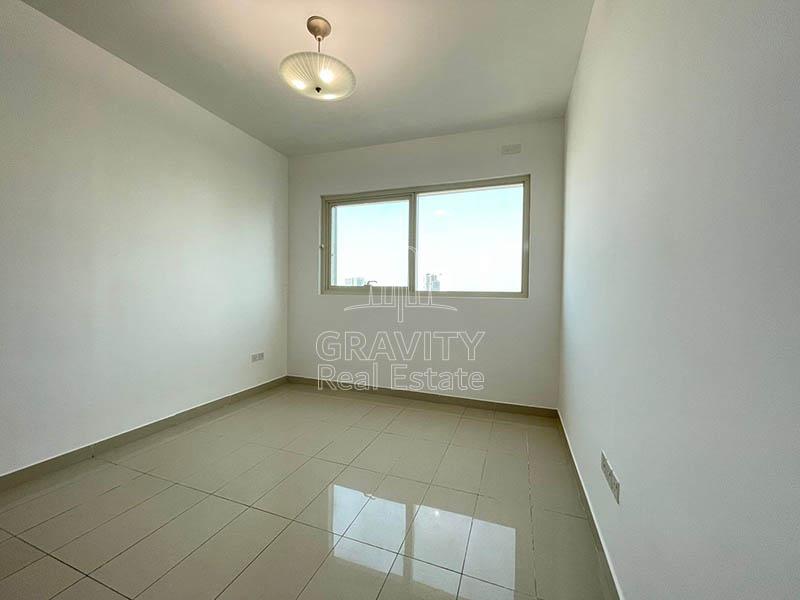 Bedroom-with-a-window-in-apartment-for-sale-Marina-Blue-Towers