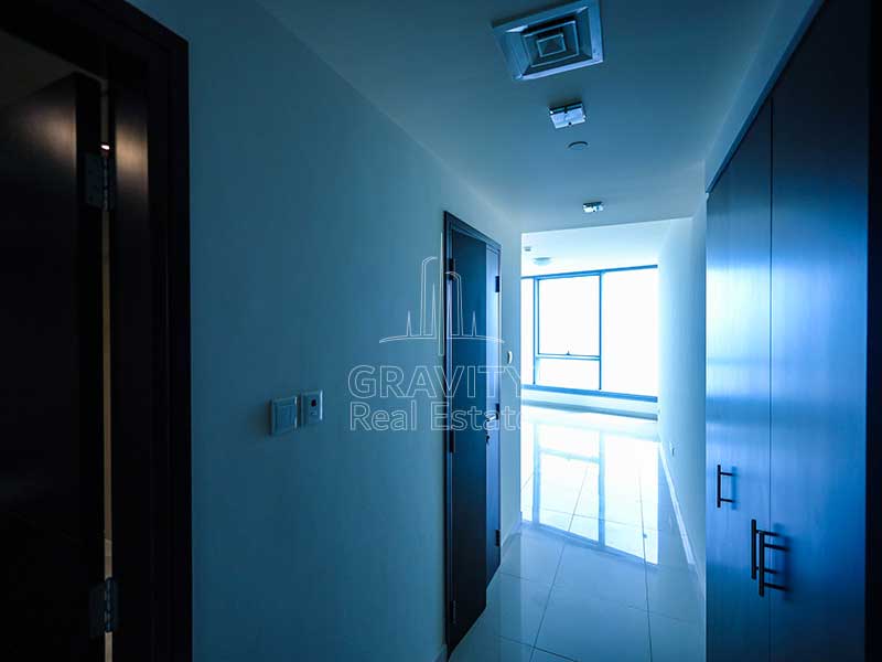 Corridor-with-built-in-wardrobe-leading-to-a-bedroom-in-Sun-Tower