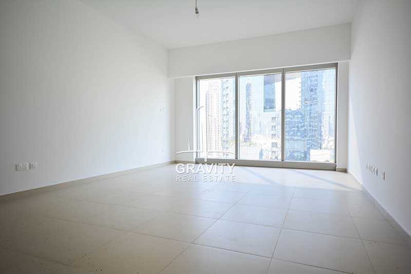 Empty-living-room-with-bedspace-in-studio-apartment-the-gate-tower