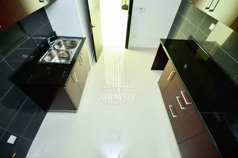 Kitchen-having-asink-black-marbeled-tabletop-in-MAG-5-Marina-Square