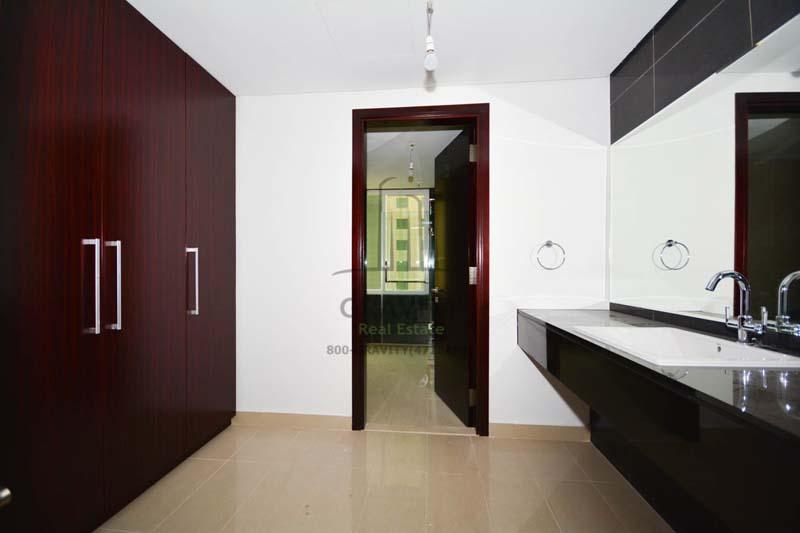 Lavish-changing-room-with-built-in-wardrobes-and-sink-in-apartment-for-sale-in-MAG-5