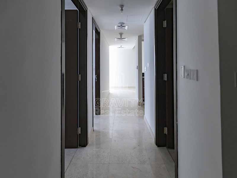 Long-corridor-between-room-in-marina-heights-tower