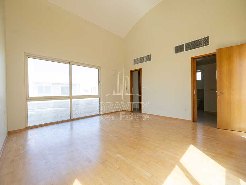 Master-bedroom-with-attached-toilet-and-semi-circular-ceiling-in-Al-Raha-Garden