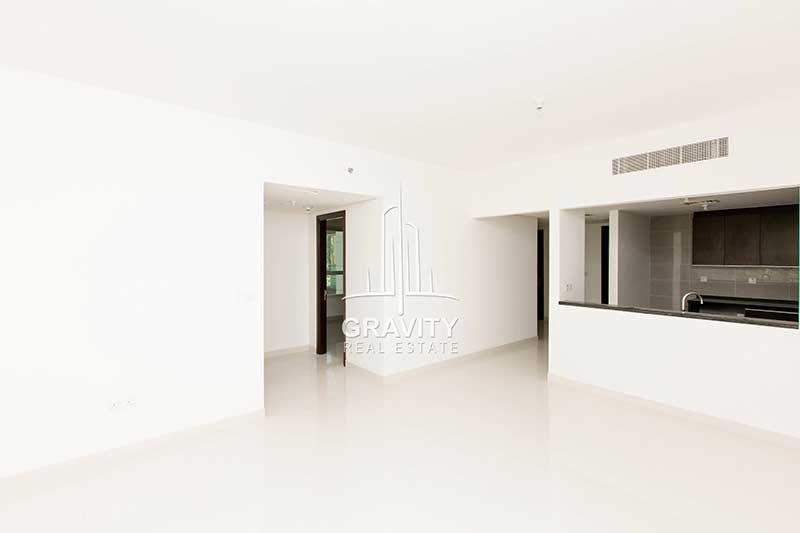 Open-living-room-withopen-kitchen-connecting-to-bedroom-in2-bedroom-apartment-for-sale-in-Burooj-views