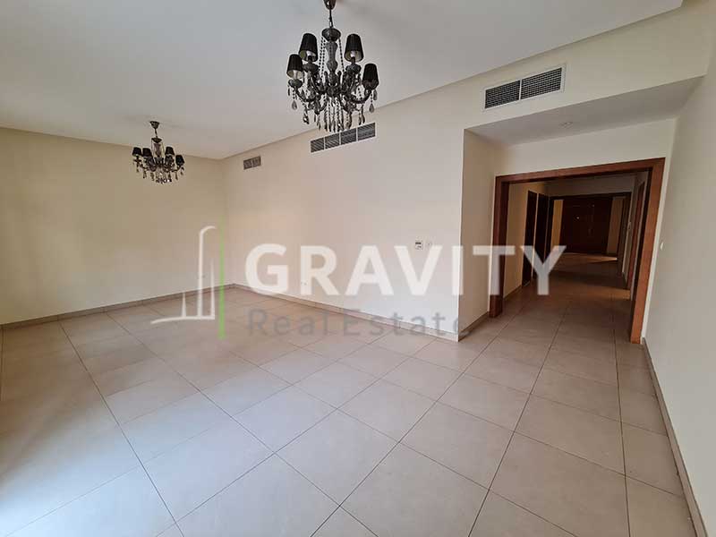 Room-in-Al-Raha-Golf-gardens-has-2-chandeliers-with-a-long-corridor