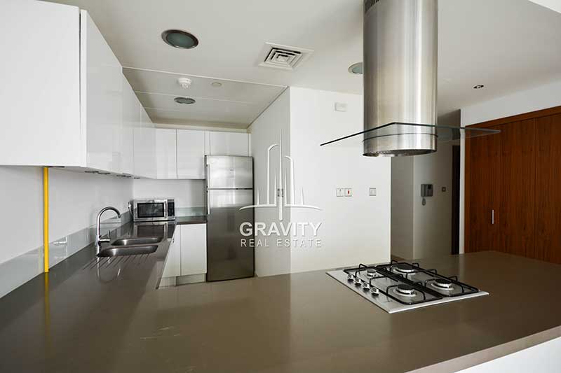 Spacious-shared-kitchen-with-built-in-upgraded-exhaust-fridge-and-microwave-in-Al-naseem