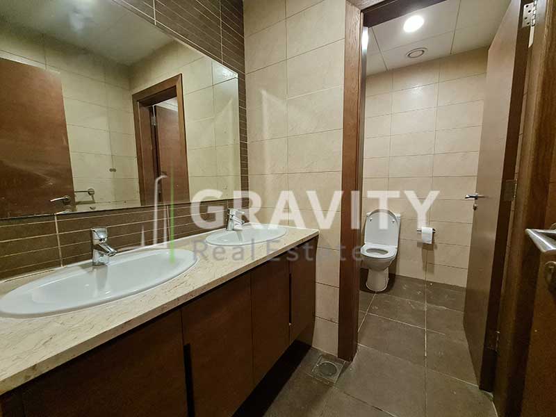 Toilet-Al-Raha-Golf-Gardens-5-bedroom-villa-for-salehaving-2-sinks-and-attached-toilet