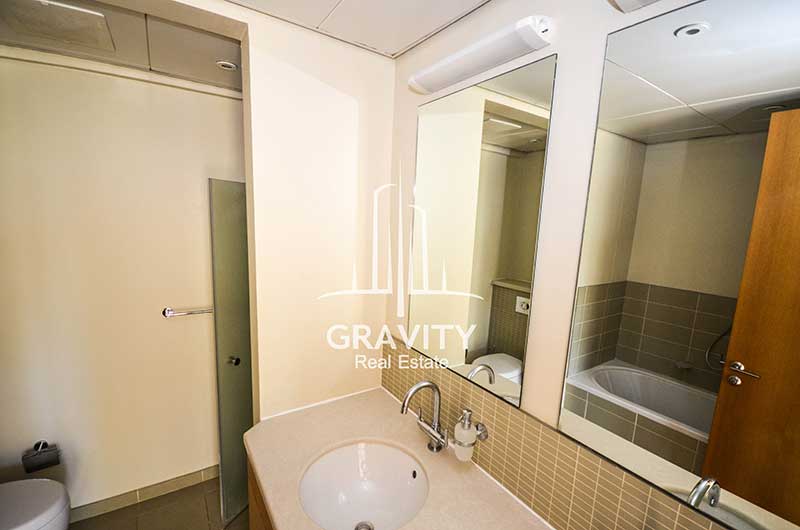 Toilet-with-2-mirrors-and-a-sink-in-4-bedroom-Townhouse-for-sale-in-Al-Raha-Gardens