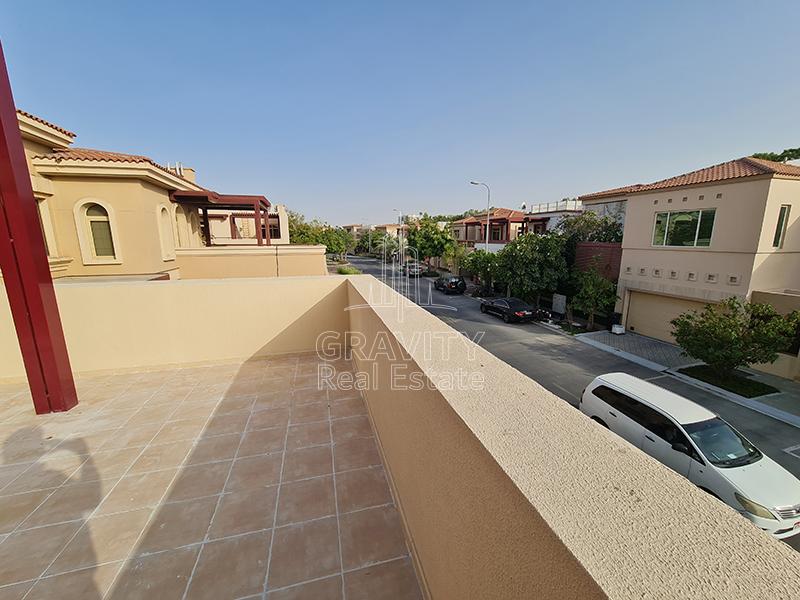 View-of-the-road-between-villas-from-the-terraced-balcony-of-a-4-bedroom-villa-in-Golf-Gardens