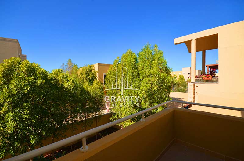 View-of-trees-from-thebalcony-of-an-Al-Raha-Gardens-4-bedroom-villa-for-sale