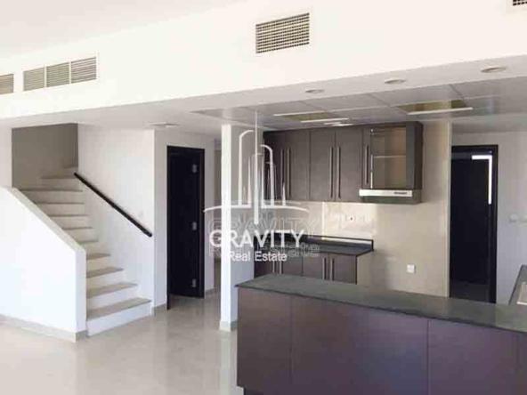 al-reef-4-bed-room-villa-floor-plan-property-living-room-with-stairs-and-open-kitchen