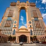 fairmont-marina-abu-dhab-huge-bulding-with-palm-on-the-side