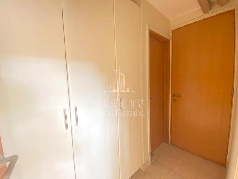 fully-fitted--white-coloured-wardrobe-in-a-bedroom-of-a-al-raha-garden-villa