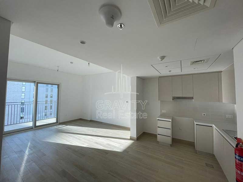 hallway-and-open-kitchen-of-one-bedroom-apartment-in-yas-island-waters-edge