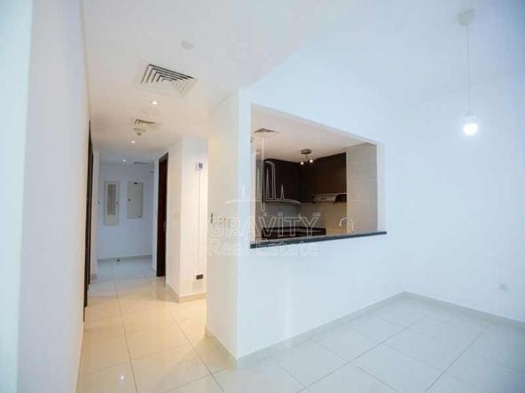 hallway-with-open-kitchen-in-2-bedroom-apartment-in-maha-tower-al-reem-island