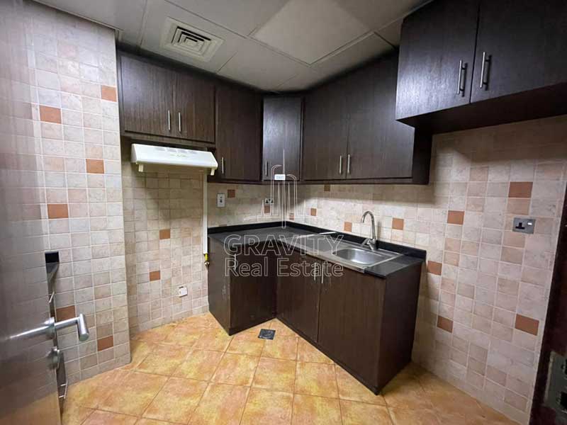 kitchen-with-built-in-cabinet-in-1-bedroom-apartment-in-hydra-avenue-abu-dhabi