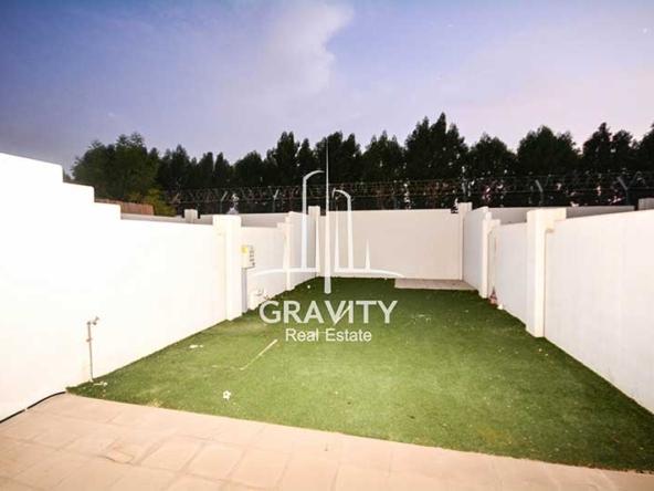 reef-abu-dhabi-property-garden-with-ceramic-on-the-top-and-white-walls