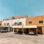 reef-villas-proerty-view-from-out-side-with-shaded-parking