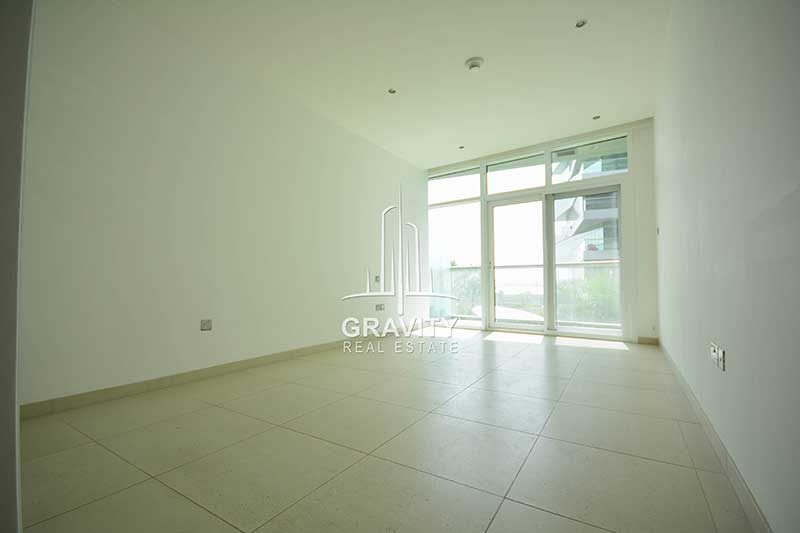 spacious-master-bedroom-with-and-a-balcony-in-a-apartment-for-sale-in-Al-Raha-beach