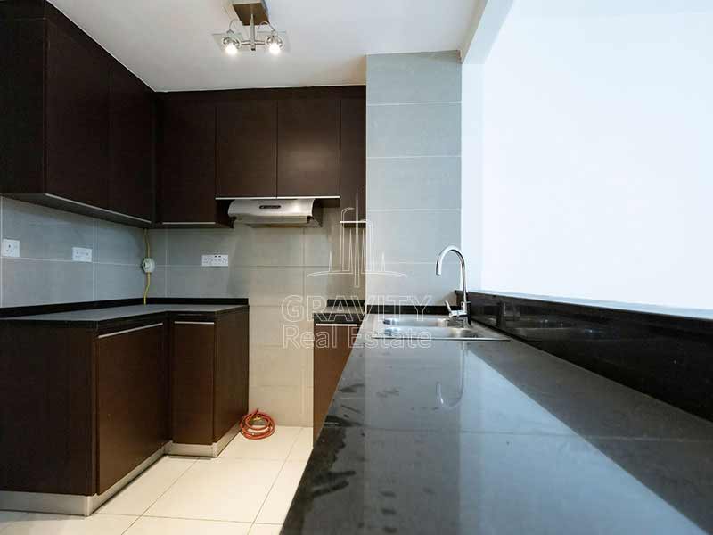 wooden-cabinet-fitted-kitchen-in-maha-tower-marina-square-abu-dhabi