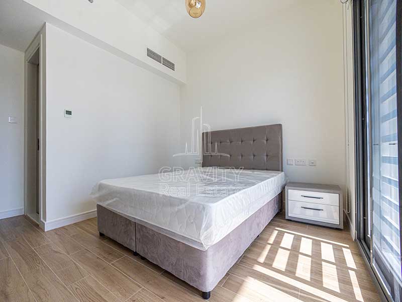 comfy-bed-and-dressing-table-in-2-bedroom-apartment-in-al-raha-lofts