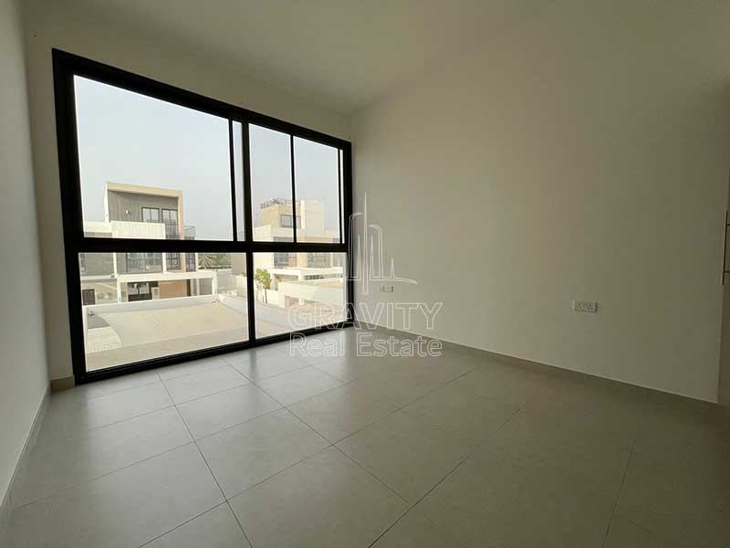 nice-bedroom-with-large-window-in-bloom-gardens-townhouse