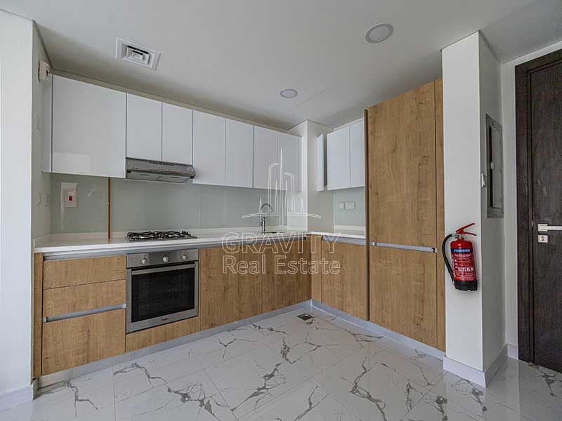 spacious-fully-fitted-kitchen-in-1-bedroom-apartment-in-al-raha-lofts