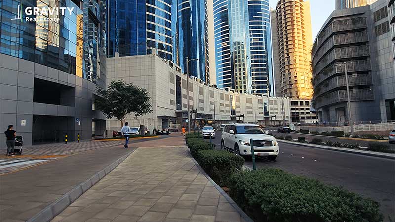 Views-of-the-city-of-lights-inner-district-with-hydra-avenue-in-the-distance-and-cars-cruising-down-the-street