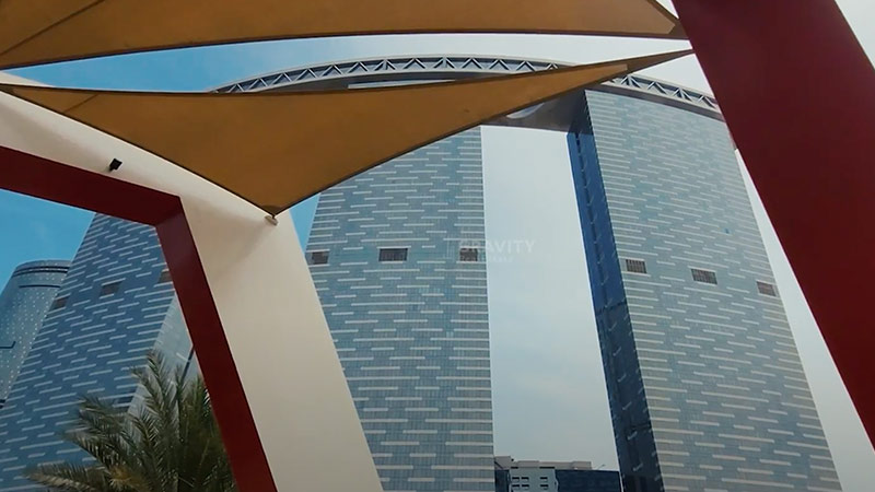 bottom-up-view-of-gate-towers-as-seen-from-gateway-park-shades