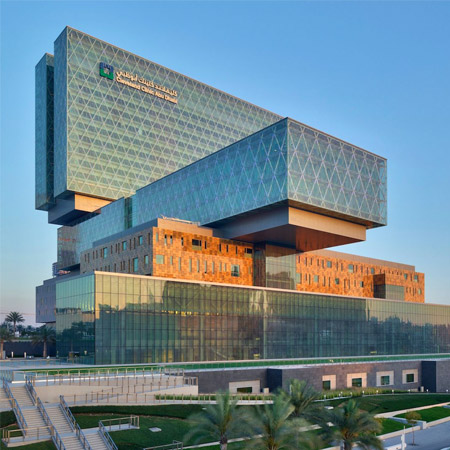 Cleaveland-hospital-with-greenery-filled-entrance-in-early-evening