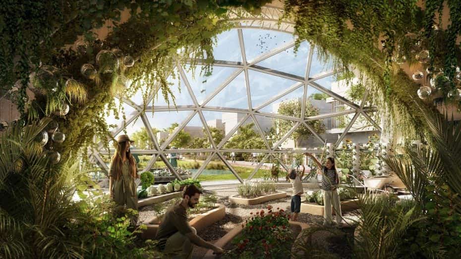 sustainable-city-abu-dhabi-interior-of-green-farming-dome-with-couple-and-two-daughters-enjoying-farming