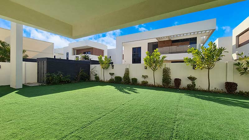 west-yas-lush-green-backyard-with-bushes-and-young-trees