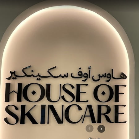 house-of-skincare-branded-logo-on-an-arch-on-the-wall