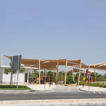 playground-and-shades-in-west-yas-community-park-during-noon