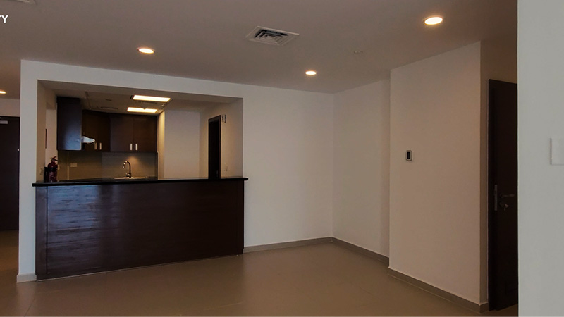 gate-towers-apartment-open-plan-kitchen-with-dark-brown-wood