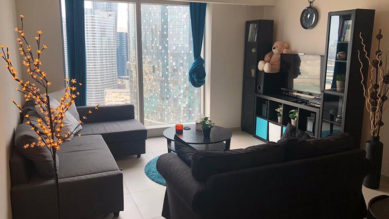 furnished-gate-towers-apartment-living-room-with-tv-unit-and-sofa-set