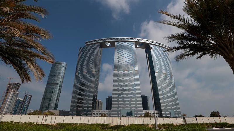 gate-towers-seen-from-under-date-palms