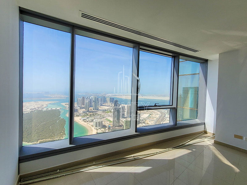 Large-floor-to-ceiling-windows-with-breathtaking-view-of-the-mangroves-and-reem-island-in-sky-tower