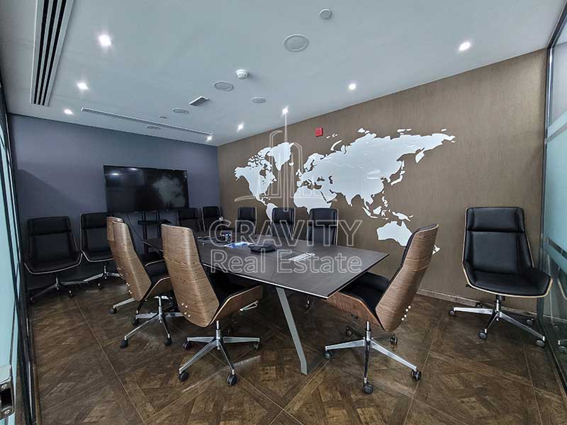 big-meeting-room-with-world-map-printed-on-a-big-wall-addax-office-tower