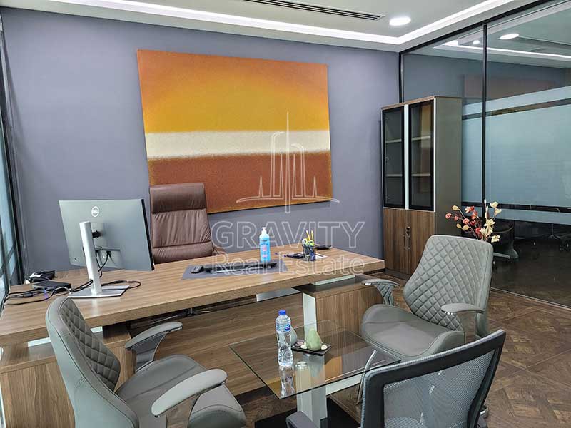 divine-office-place-with-arts-on-the-wall-and-furnishers-and-printed-carpets-on-the-floor-addax-office-tower