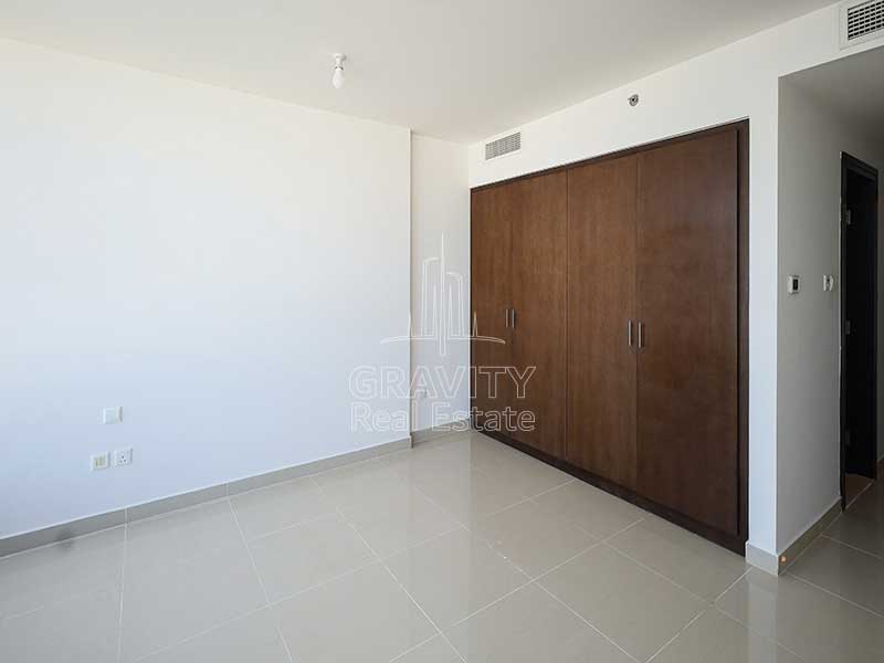 master-bedroom-with-brown-built-in-wardrobes-in-1-bedroom-apartment-in-sky-tower-reem-island