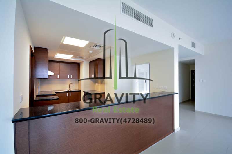 modern-and-neat-open-kitchen-with-counter-top-in-a-2-bedroom-apartment-in-arc-tower-reem-island