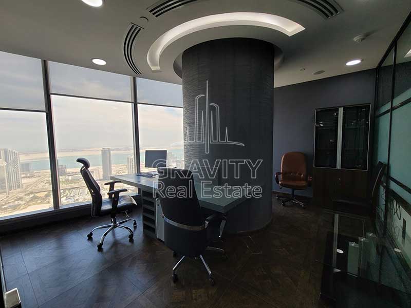 office-room-with-glass-panels-and-a-big-pilllar-in-the-middle-addax-office-tower