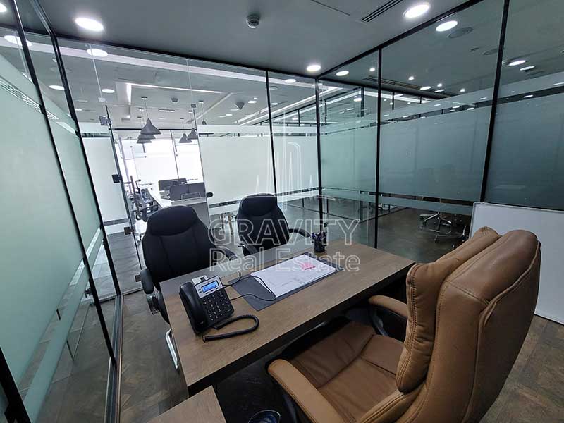 small-meeting-room-with-nicely-furnished-chairs-and-table-addax-office-tower