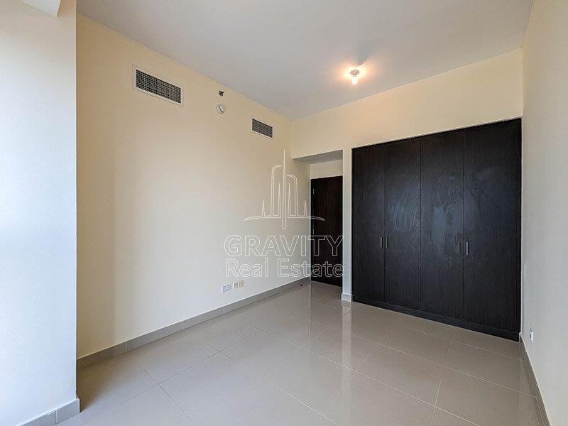 spacious-bedroom-with-built-in-wardrobe-in-a-3-bedroom-apartment- in-marina-bay-reem-island