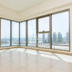 spacious-living-room-with-huge-windows-and-marble-tiles-in-wave-tower-reem-island-apartment