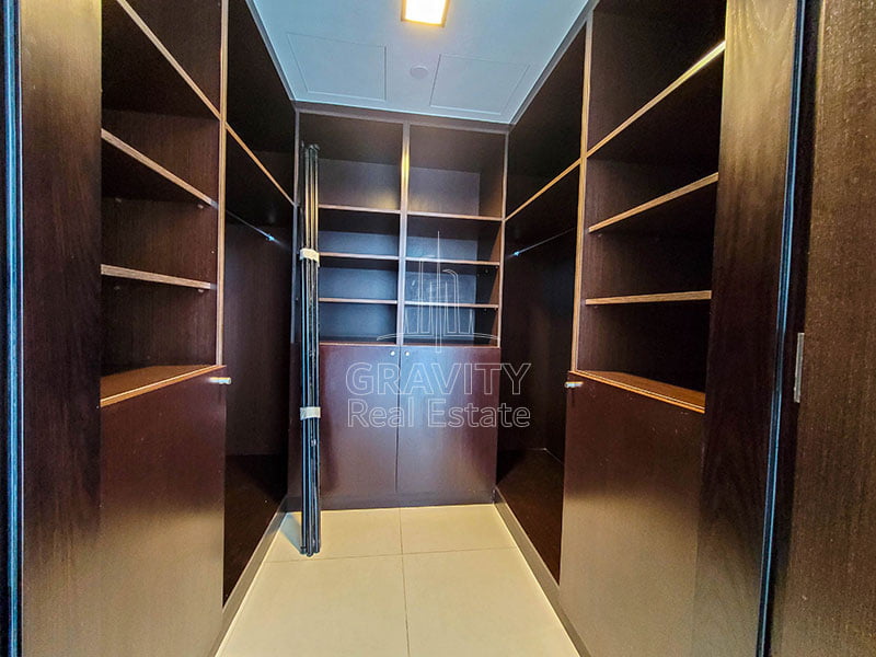 walk-in-closet-in-nice-2-bedroom-apartment-in-sky-tower