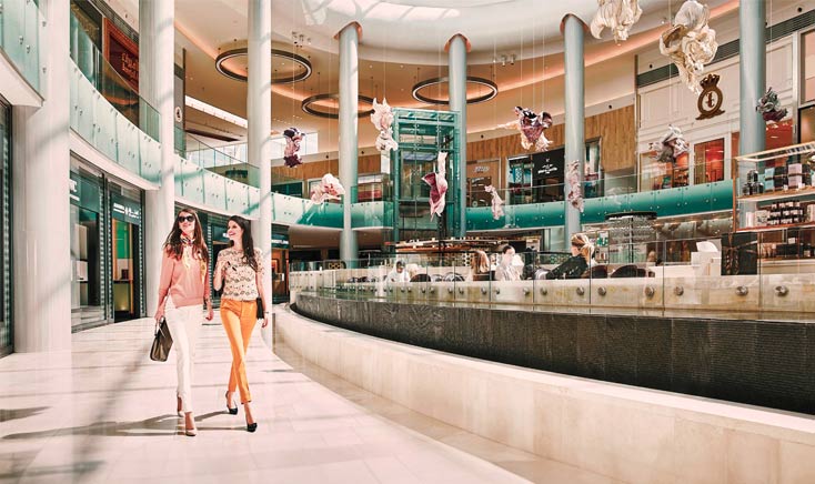 yas-mall-interior-with-two-young-girls-strolling-about