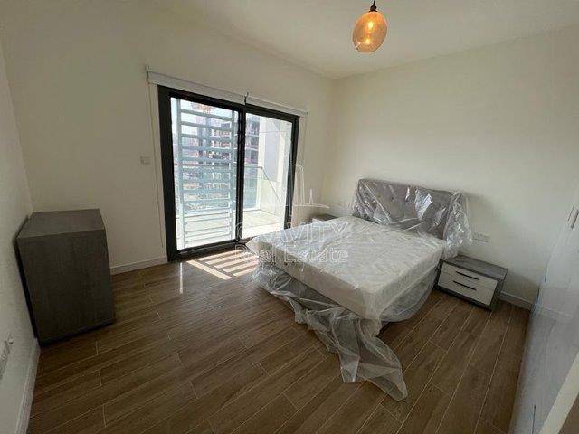 amazing-bedroom-with-brand-new-lavish-bed-wooden-floors-and-balcony-in-al-raha-lofts-2